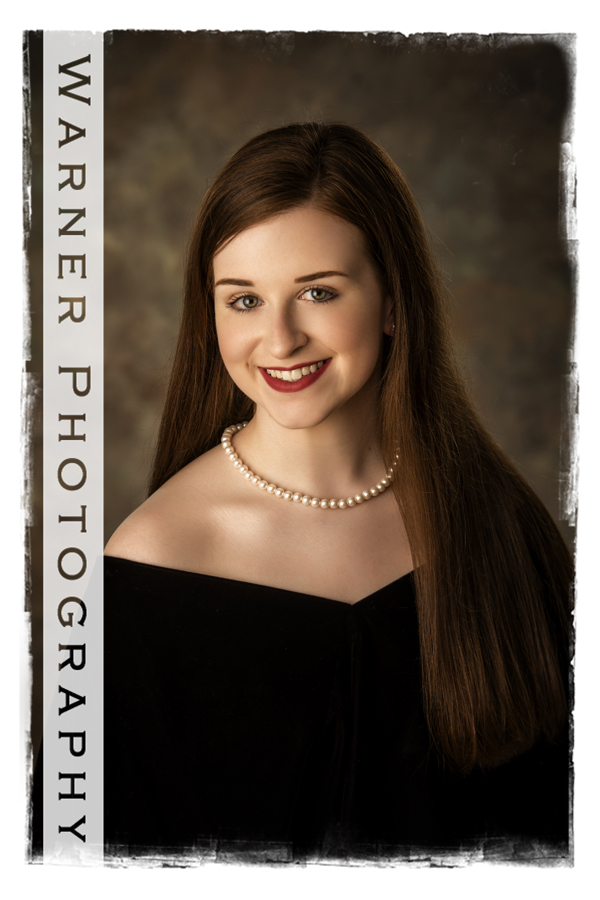 Classic Senior portrait of Emma taken at the Warner Photography Studio