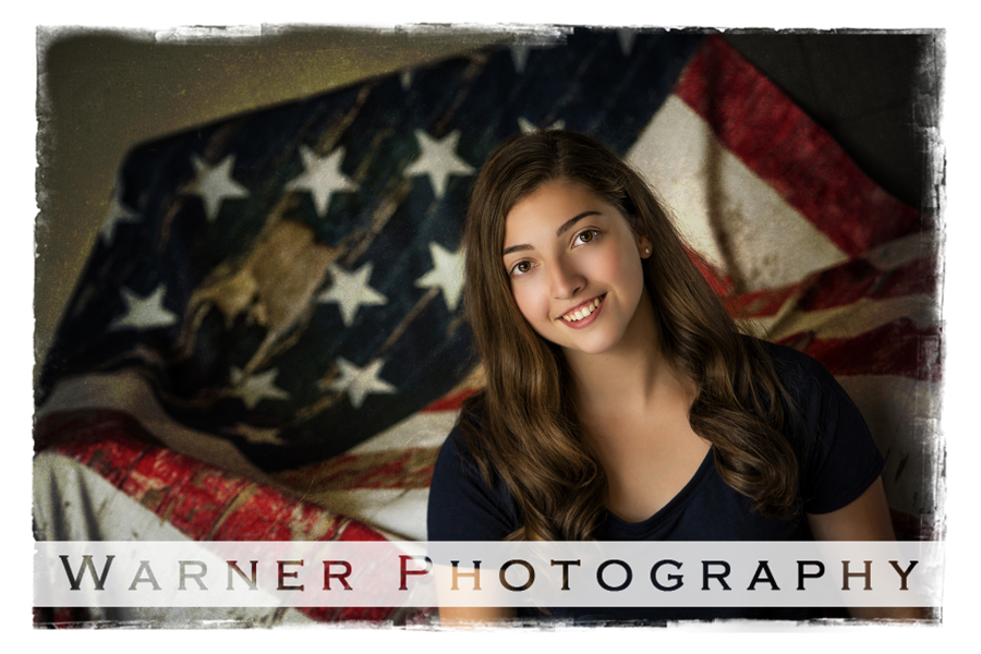 Midland High School Senior portrait of Caroline, at the Warner Photography Studio with an american flag background