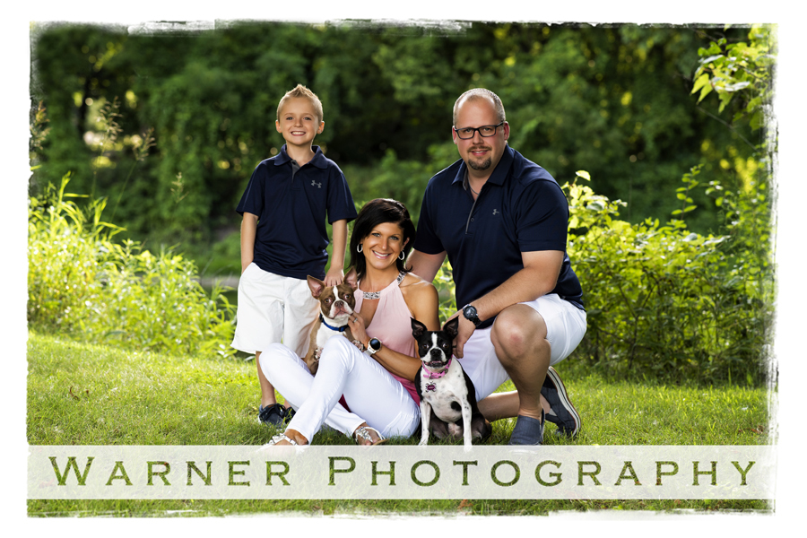 Ulery Family Portrait at Emerson Park in Midland Michigan with their son and their boston terriers by Warner Photography in Midland Michigan