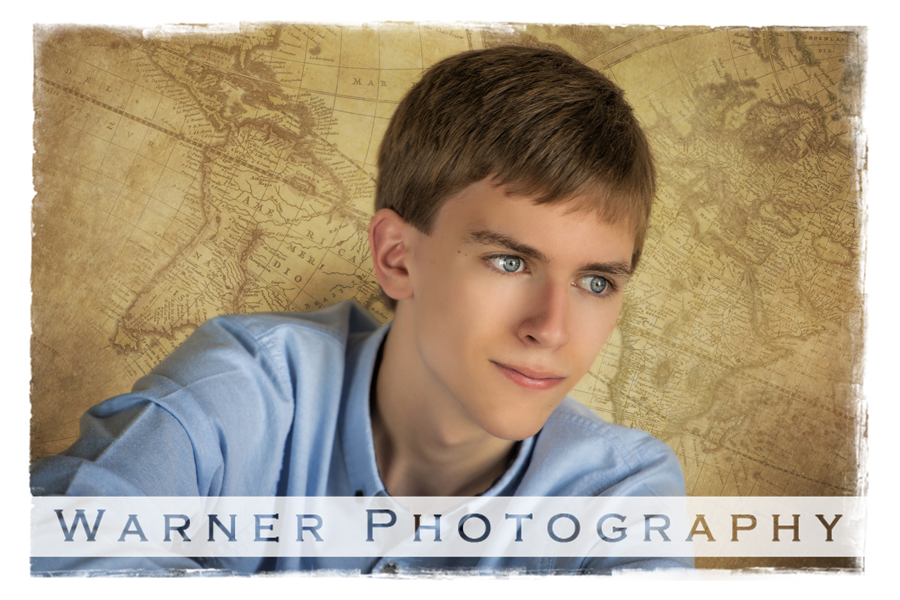 A studio portrait of Bullock Creek Senior Sam with a map background