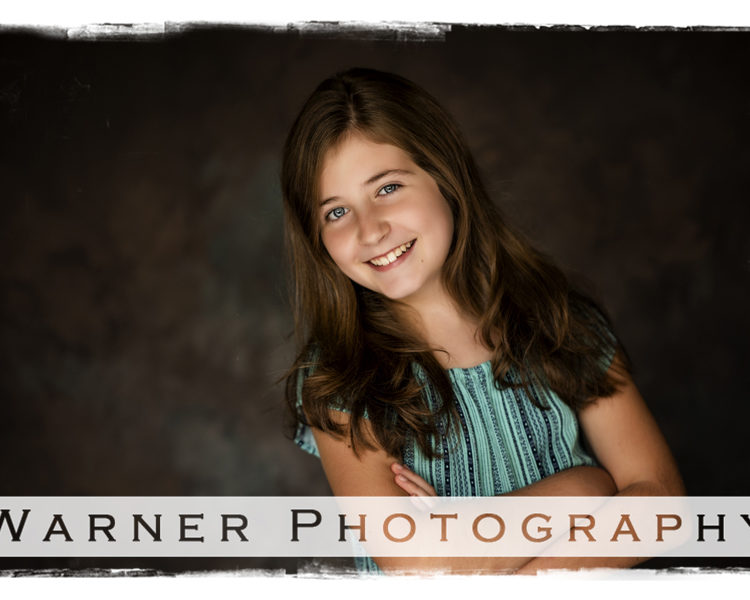 Traditional studio portrait of Danielle for her Back to School session at the Warner Photography Studio
