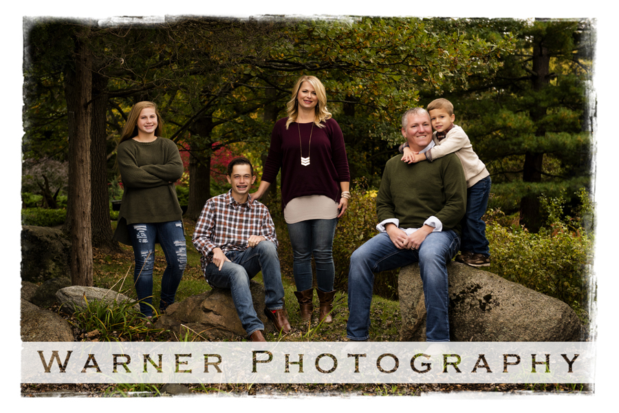An outdoor family portrait of the Puls Family at Dow Gardens for the fall colors