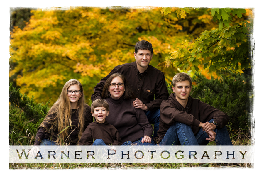 Fall family portrait of the Telgenhoff family at Dow Gardens with the yellow fall leaves in Midland Michigan