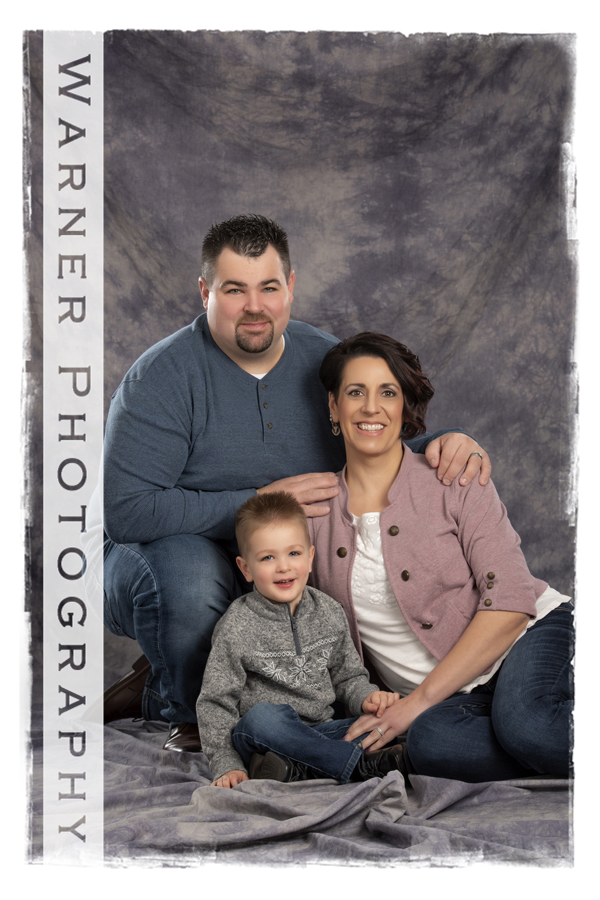 A classic family portrait of the Swanson family at the Warner Photography Studio