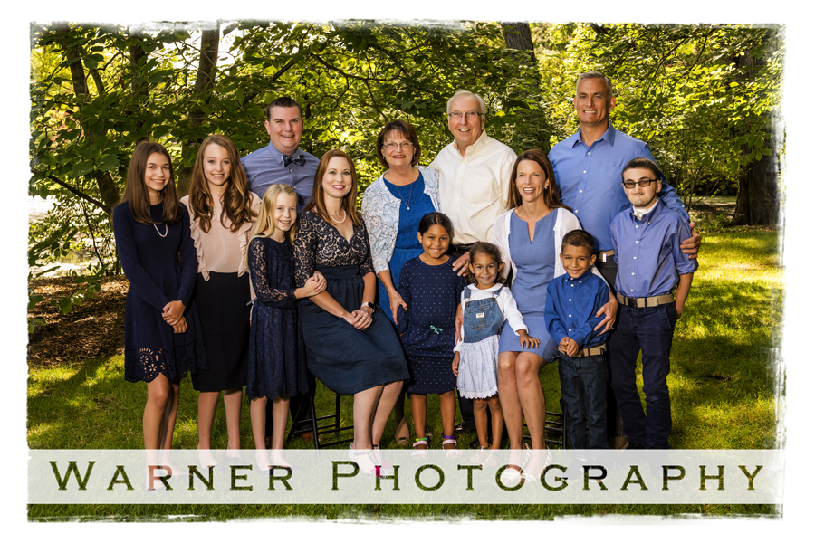 Outdoor family portrait of the Buckler family at Dow Gardens