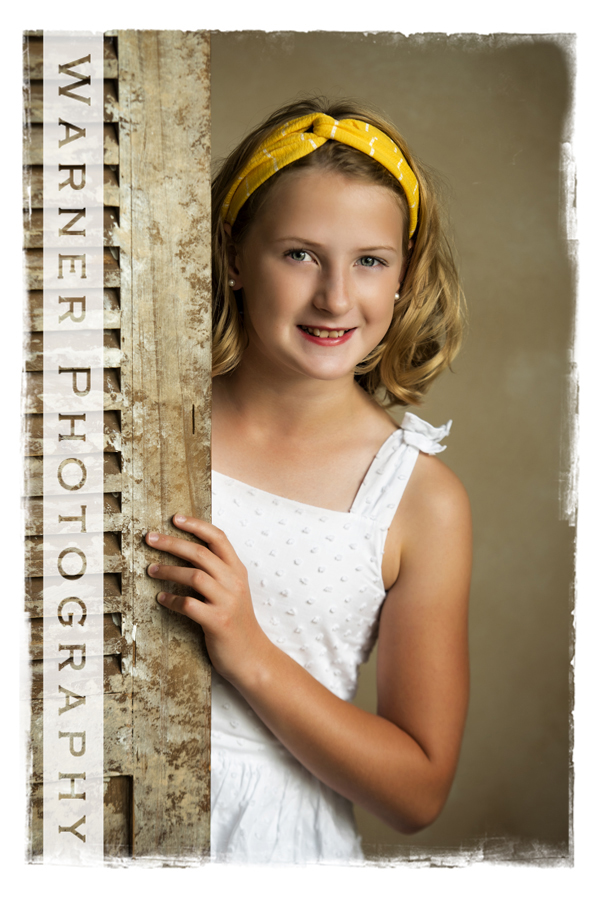 Studio Back to School portrait of Monica with a shutter
