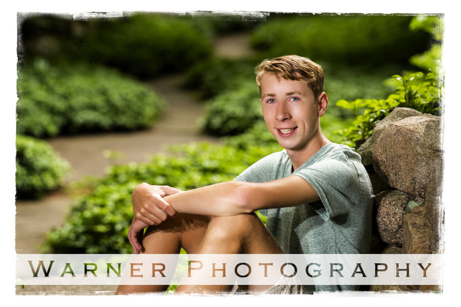 Outdoor senior portrait of Midland High School senior Nick at Dow Gardens