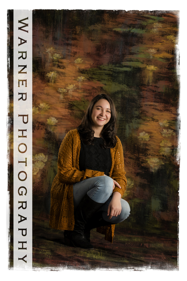 A studio portrait of Dow High senior Lily with brown tones