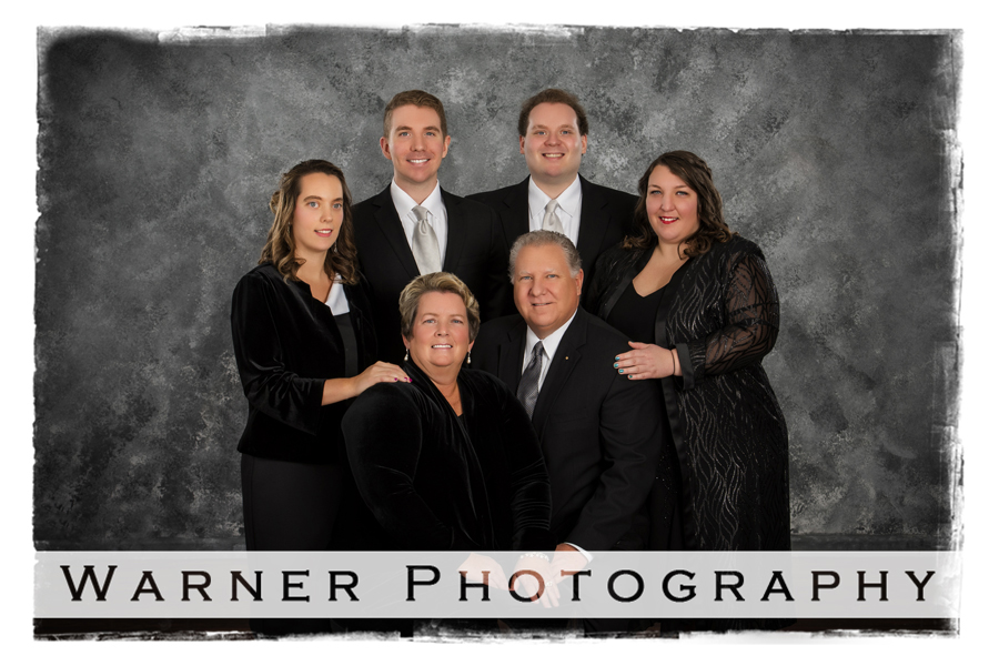 A studio portrait of the Ware family