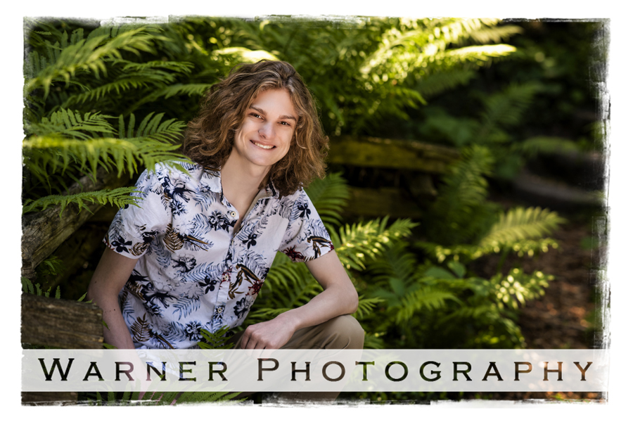 Outdoor senior portrait of Jack at Dow Gardens