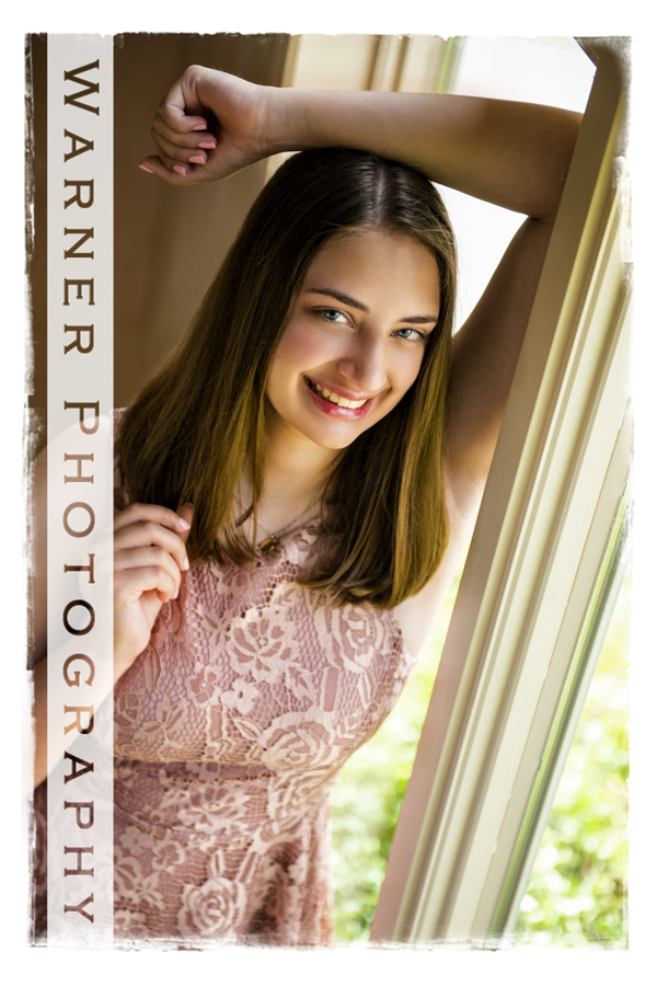 Studio portrait of Midland High School senior Alexandra by a window