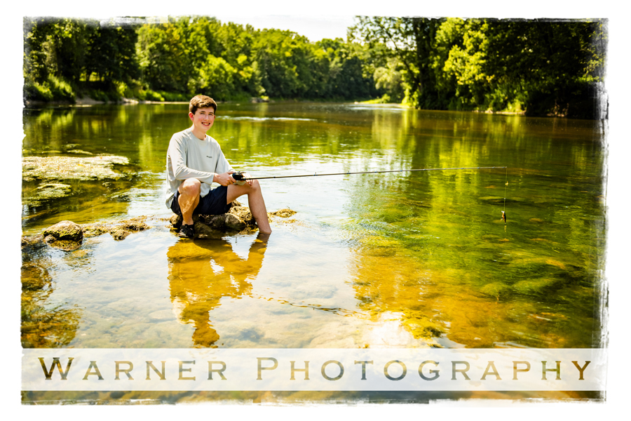 An outdoor portrait of Midland High School senior Sam at the Chippewa Nature Center in the river