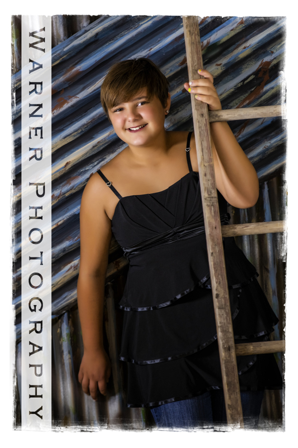 A studio portrait of Emma