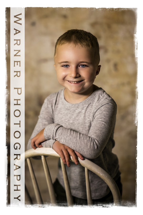 a studio portrait of Liam for his Back to School session