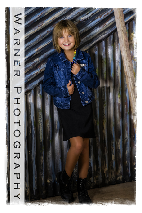 A studio portrait of Riley for her Back to School session