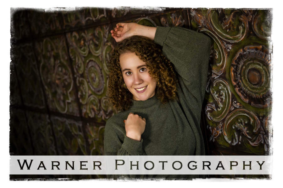 a studio portrait of Okemos High School senior Lily