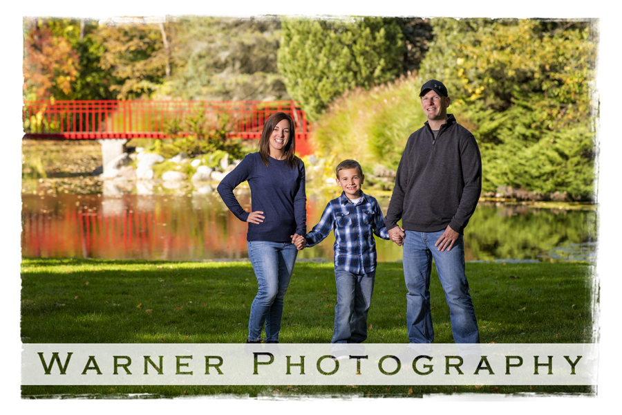 An outdoor portrait of the Meyers family at Dow Gardens