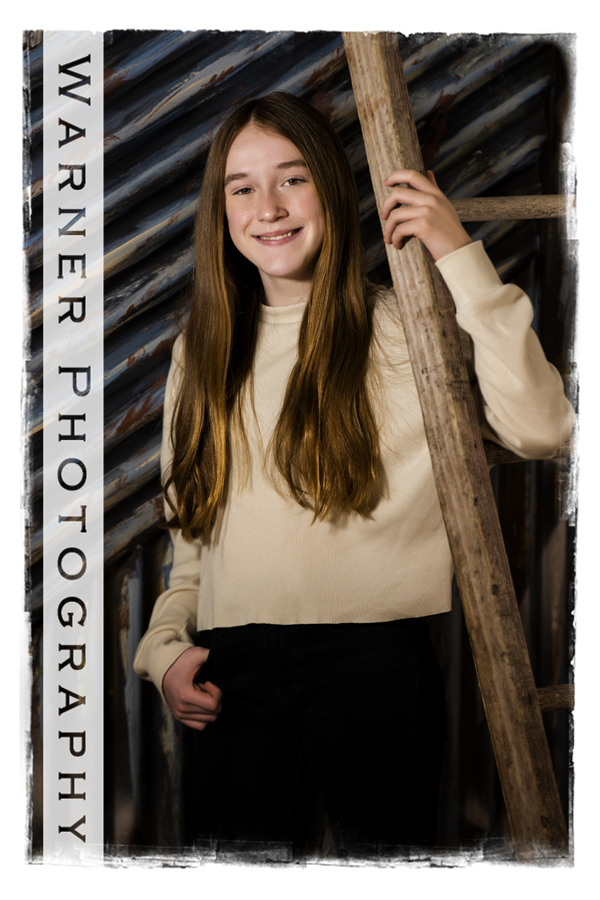 a studio portrait of Eliott for her Back to School session