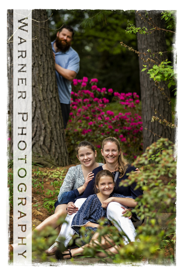 an outdoor family portrait of the Lepley family at dow gardens