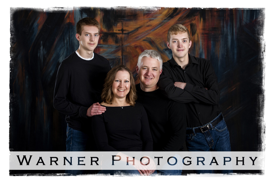 A studio portrait of the Jenks family