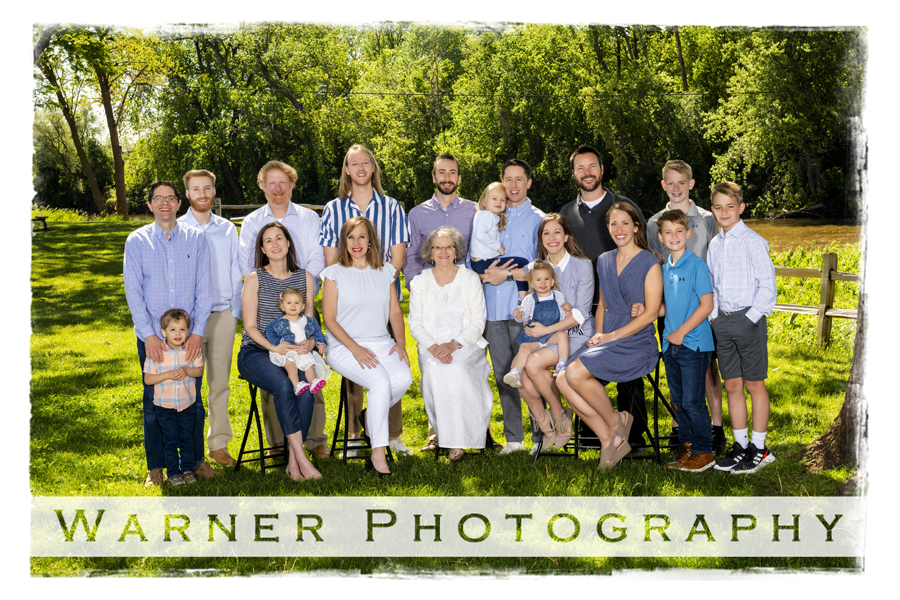 an outdoor portrait of the Pammler family near the tridge in Downtown Midland