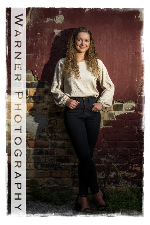an outdoor portrait of Midland High School senior Tesa in Downtown Bay City
