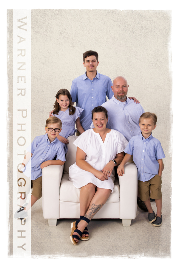 A studio portrait of the Fishtorn family at the Warner Photography Studio