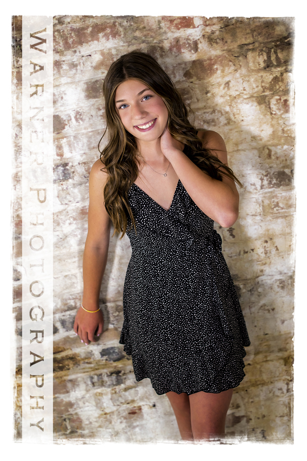 A studio portrait of Jensyn for her Back to School session at the Warner Photography Studio