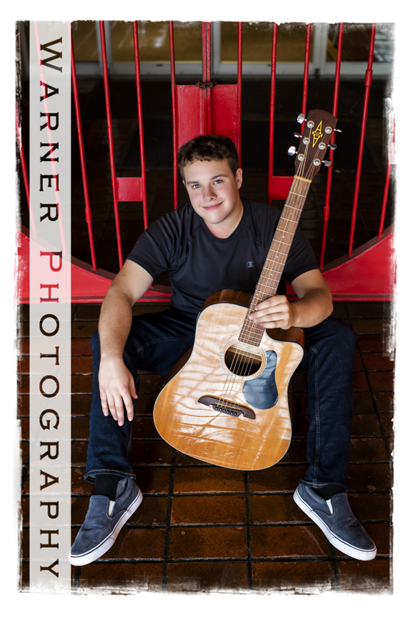 An on location portrait of Dow High School senior Mathias in Downtown Midland by Warner Photography