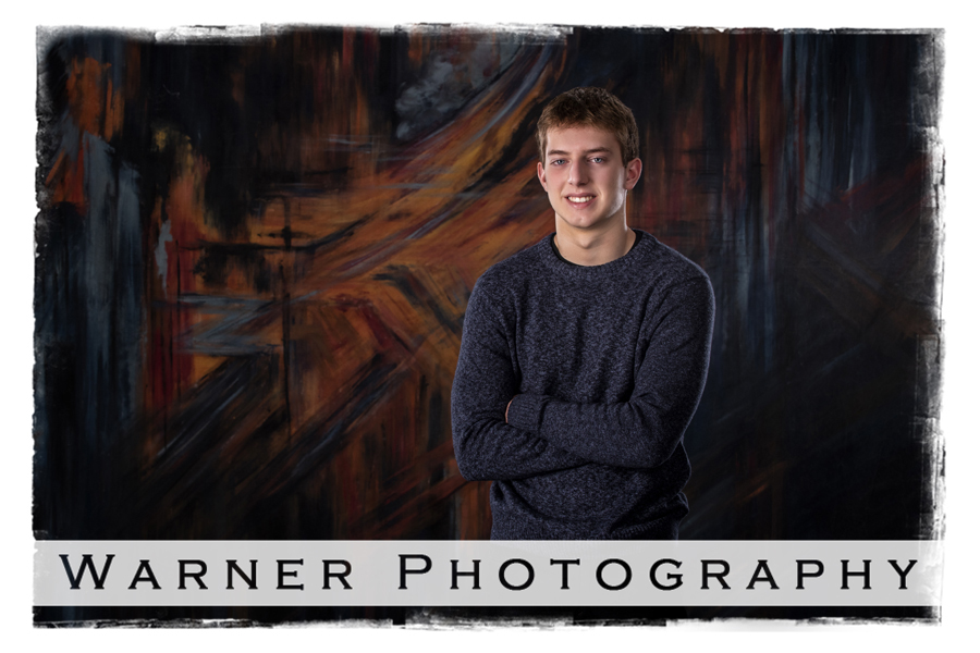 A studio portrait of Dow High School senior Samuel at the Warner Photography Studio