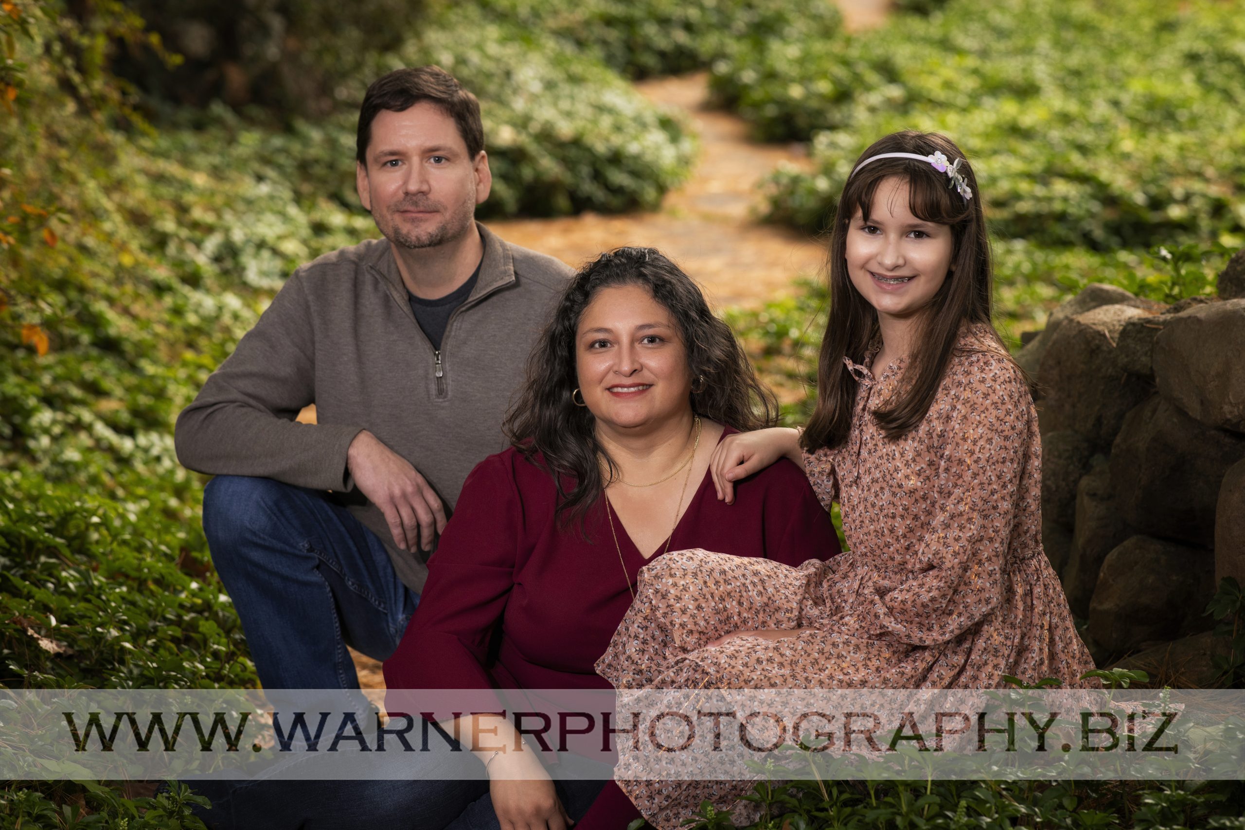 An on location portrait of the Ackerman family at Dow Gardens by Warner Photography