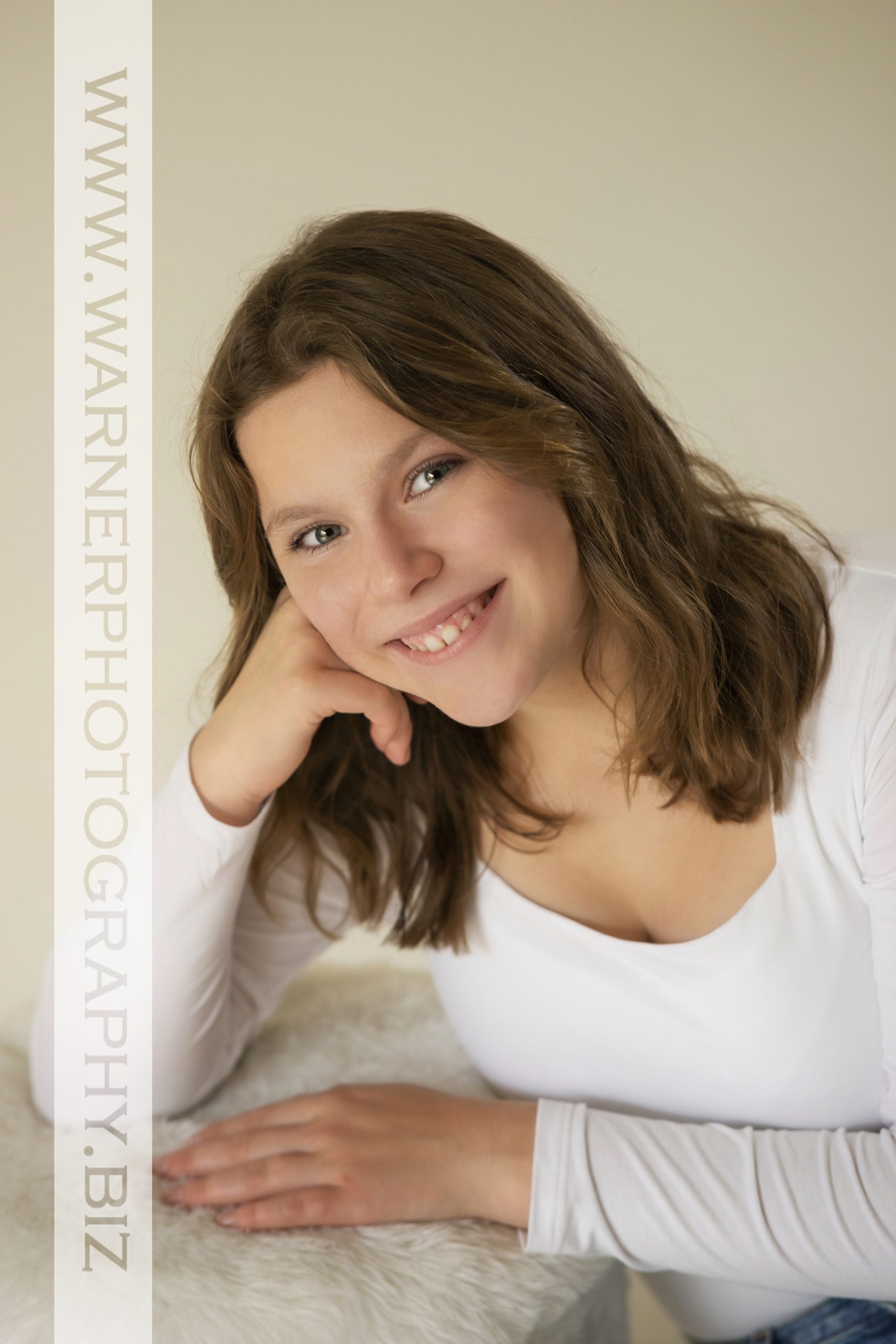 A studio portrait of Dow High School senior Lindsey at the Warner Photography Studio