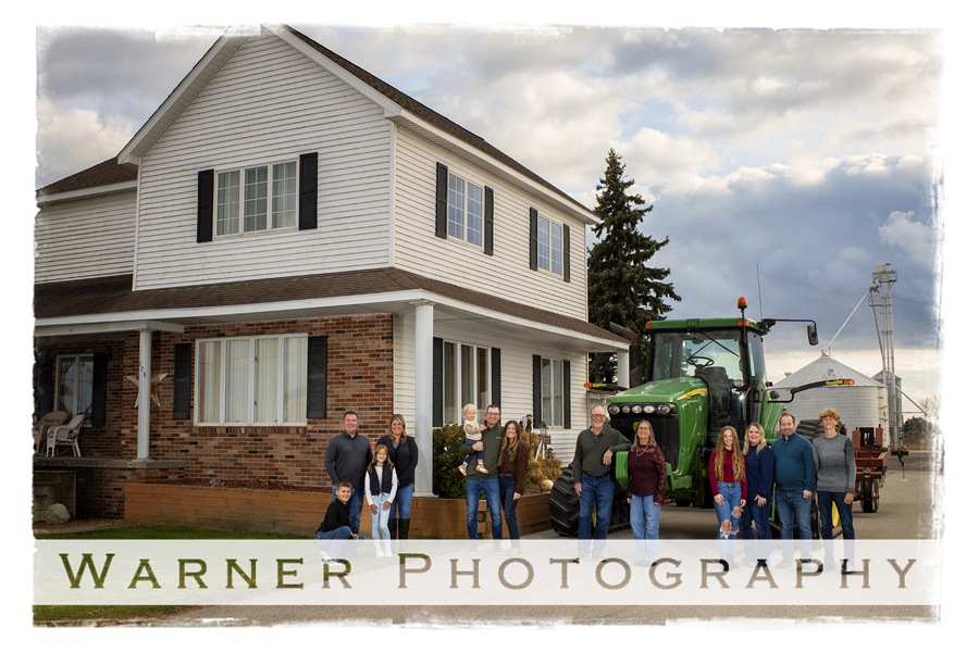 An on location portrait of the Dore family on their Centenial Farm by Warner Photography