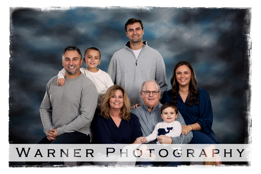 A studio portrait of the Taglauer family at the Warner Photography Studio in Midland Michigan
