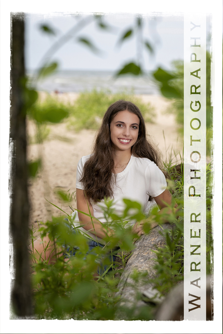 An outdoor senior portrait of Midland High School senior Katelynn at Bay City State Park by Warner Photography