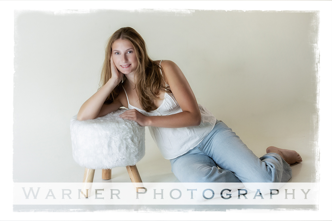 A studio portrait of Monica for her Back to School session at the Warner Photography Studio