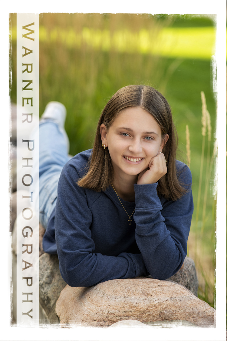 An on location portrait of Dow High School senior Amaya in Downtown Midland by Warner Photography