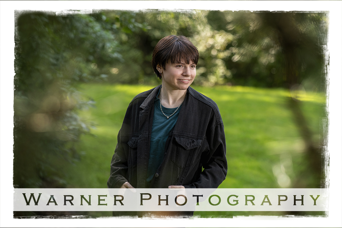 An on location portrait of Dow High School senior Emily at Dow Gardens by Warner Photography