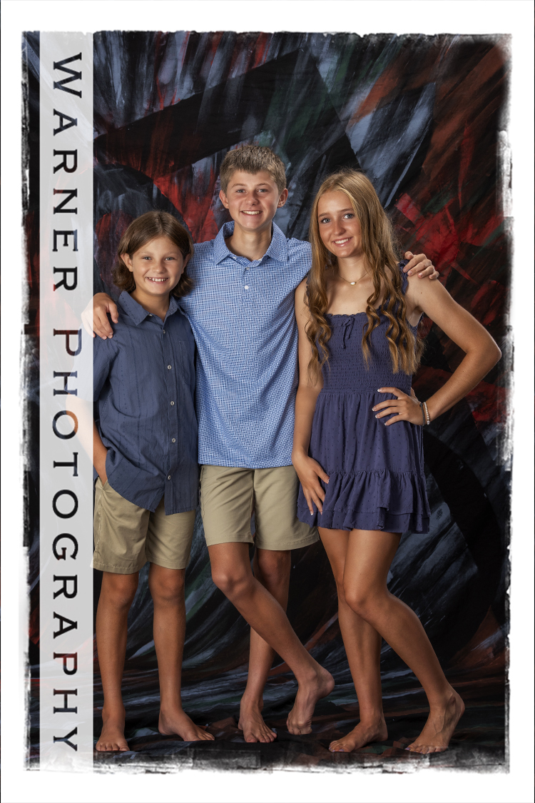 A studio portrait of the Murtha kids for their Back to School session at the Warner Photography Studio