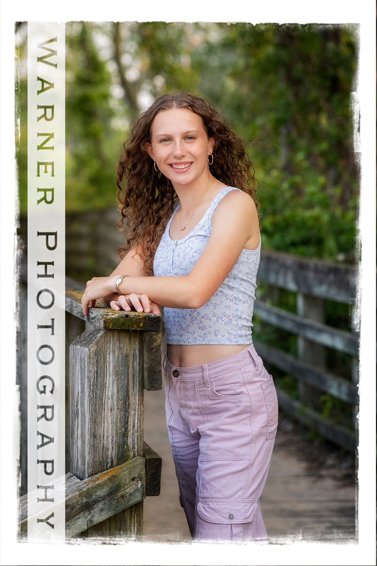 An on location portrait of Dow High School senior Norah at Bay City State Park by Warner Photography