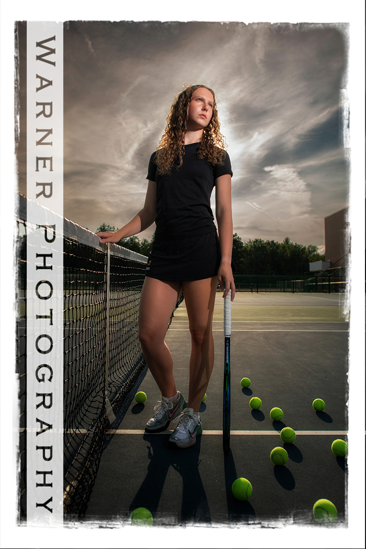 An on location portrait of Dow High School senior Norah on the Dow High Tennis courts by Warner Photography