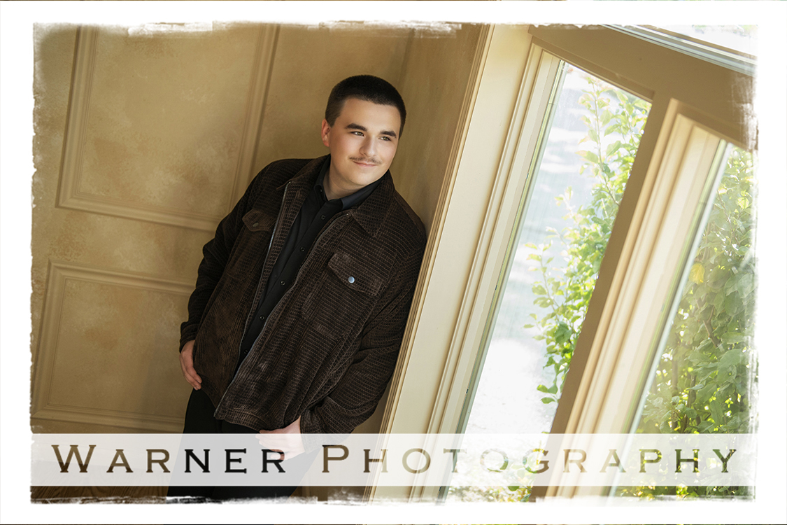 A studio portrait of Dow High School senior Steven at the Warner Photography Studio in Midland Michigan