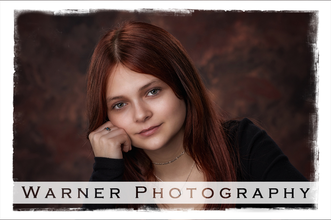 A studio portrait of Bullock Creek High School senior Emerie at the Warner Photography Studio in Midland Michigan