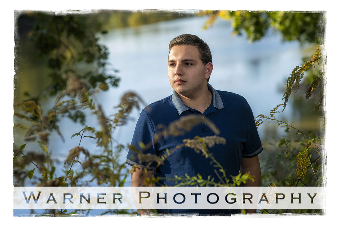 An on location portrait of Dow High School senior Matthew at Emerson Park by Warner Photography