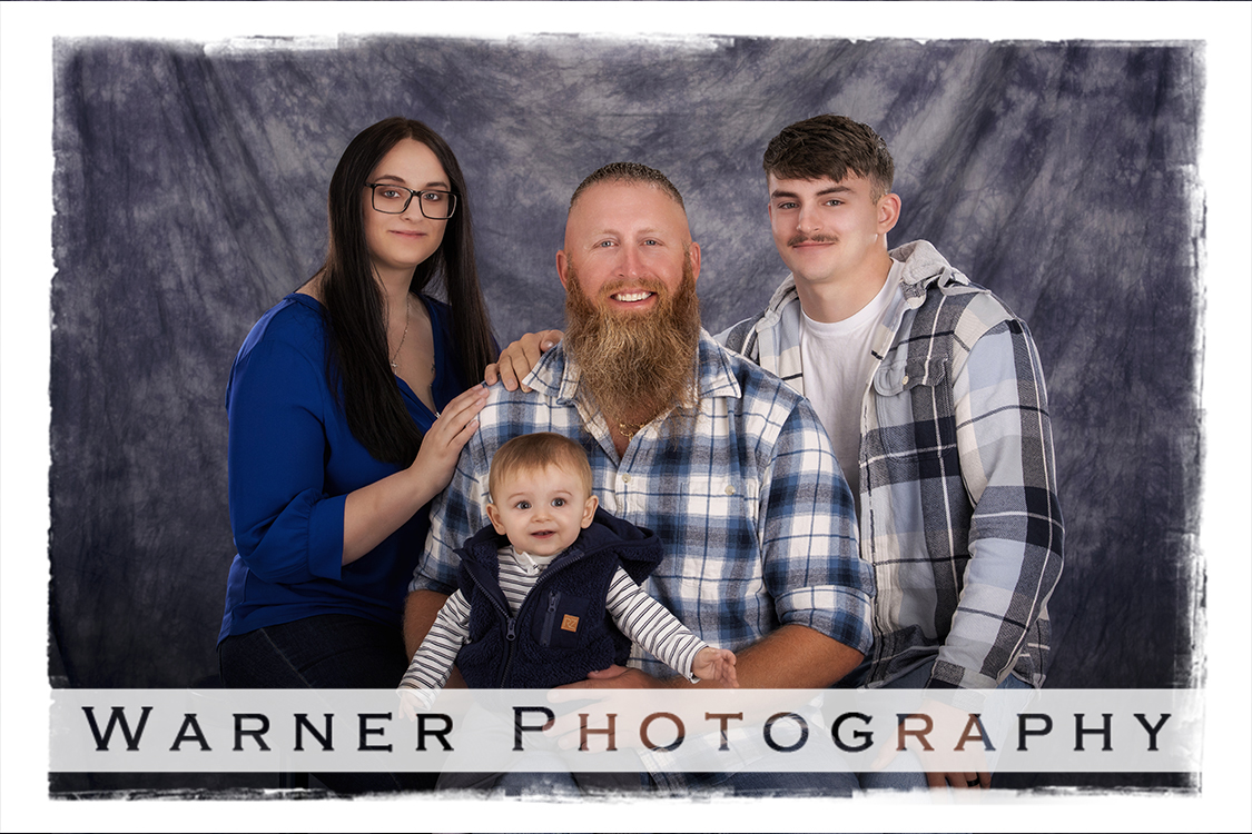 A studio portrait of the Rytlewski family at the Warner Photography Studio in Midland Michigan