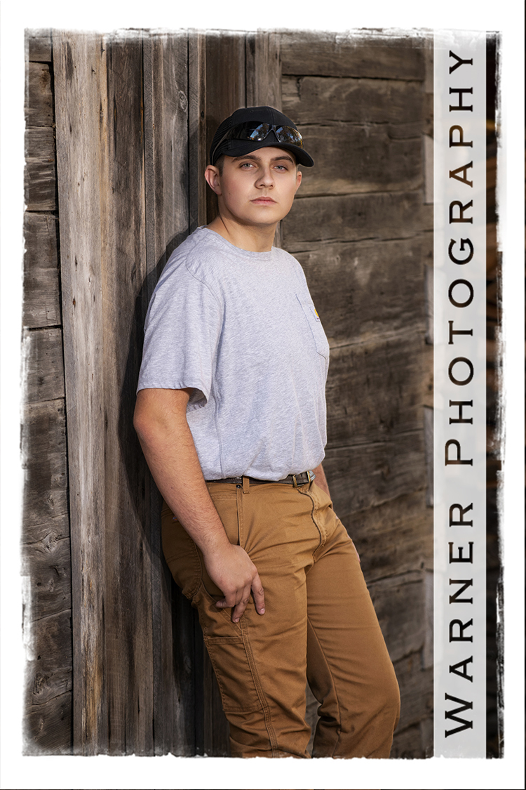 An on location portrait of Calvary Baptist Academy senior Noah at Chippewa Nature Center by Warner Photography