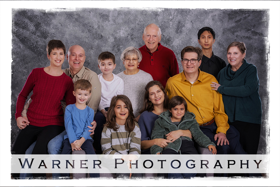 A studio portrait of the Tolton family at the Warner Photography Studio in Midland Michigan